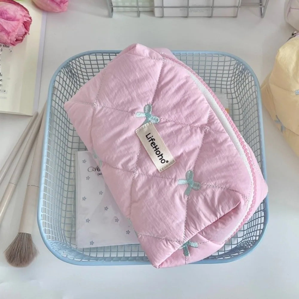 Trousse de maquillage avec petit noeud