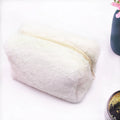 Trousse de maquillage en moumoute