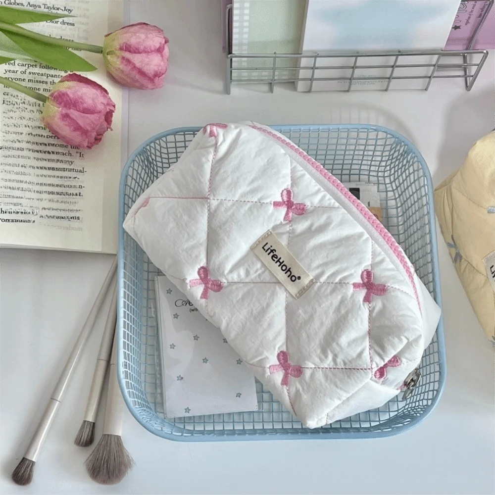 Trousse de maquillage avec petit noeud